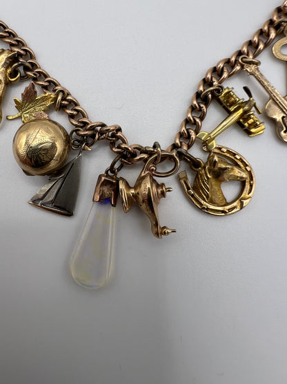 Gold Charm Bracelet With Many Unusual and Rare Charms
