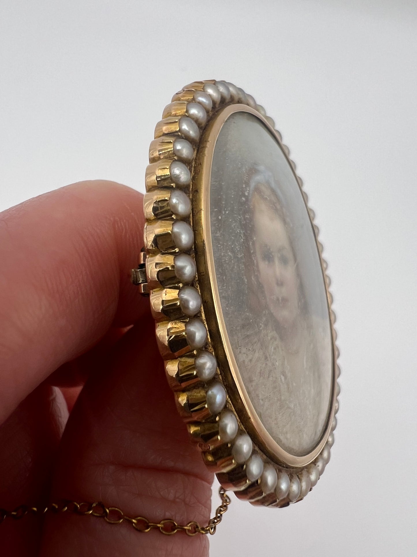 Oval Portrait Miniature Brooch Of Pretty Girl in Gold And Pearl Frame