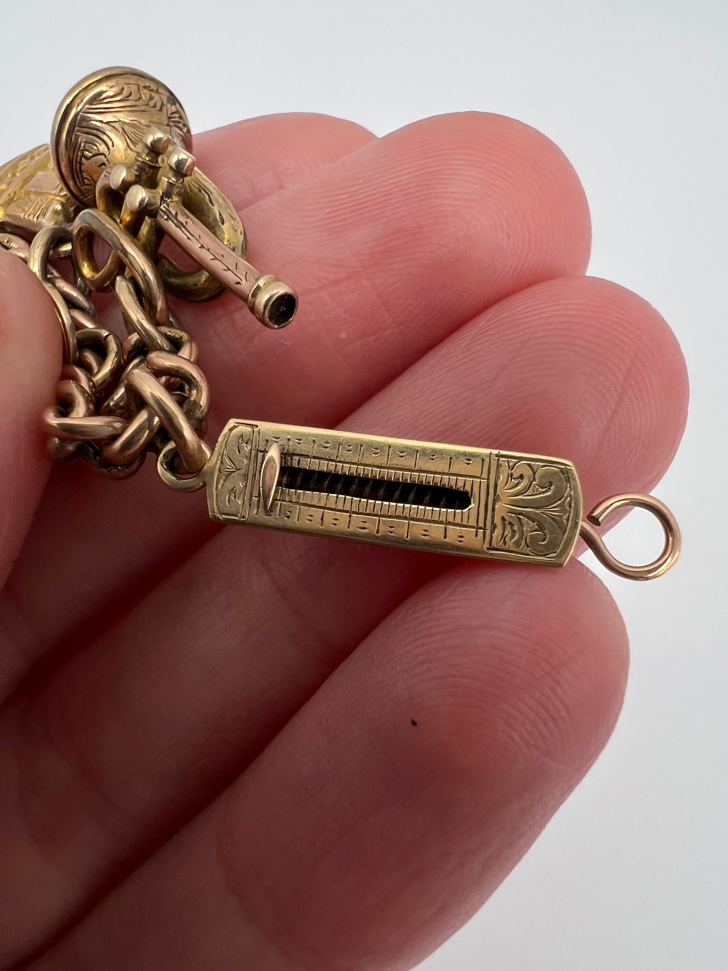 Gold Charm Bracelet With Many Unusual and Rare Charms