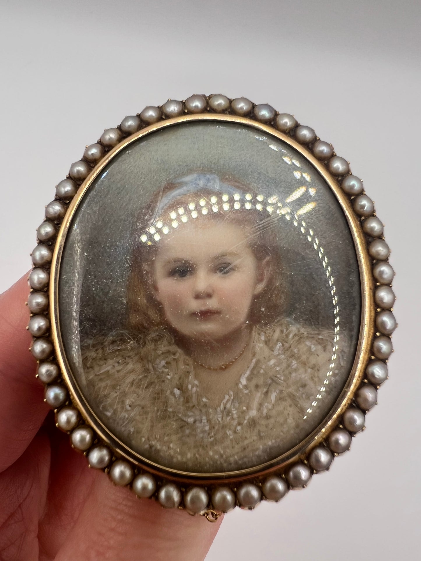 Oval Portrait Miniature Brooch Of Pretty Girl in Gold And Pearl Frame