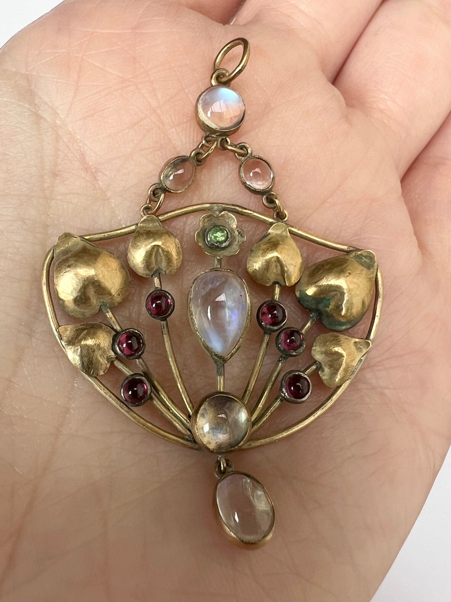 Arts & Crafts Gold Moonstone Garnet Peridot Pendant in the style of Murrle Bennett