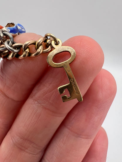 Gold Charm Bracelet With Many Unusual and Rare Charms