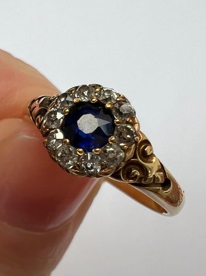 1888 Cute Sapphire Old Cut Diamond Halo 18ct Gold Ring