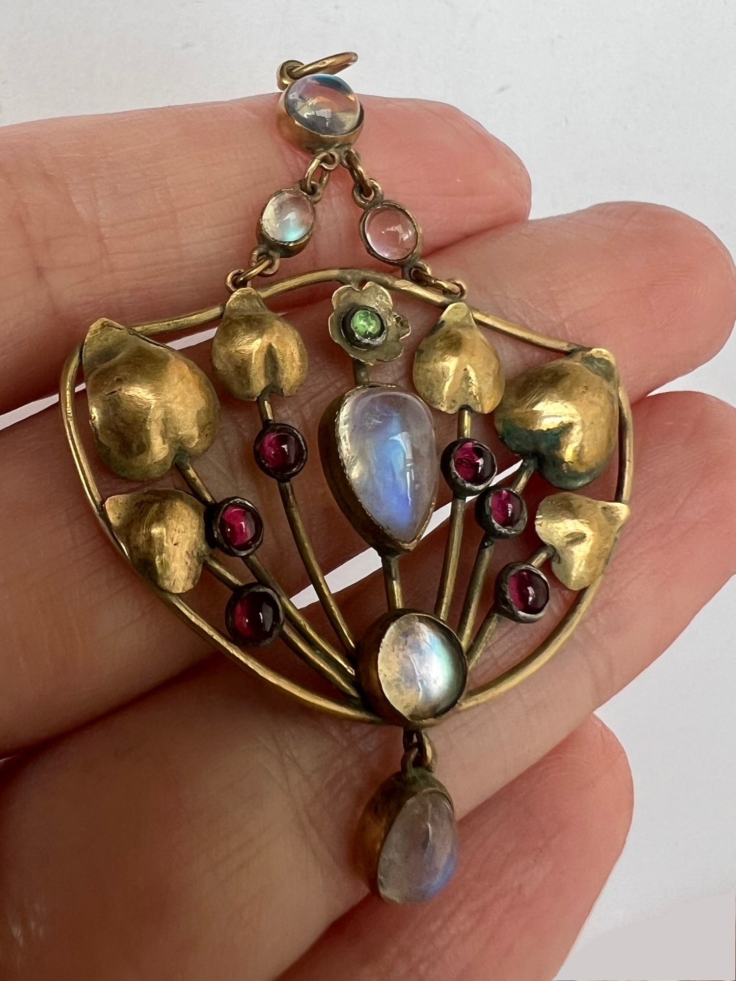 Arts & Crafts Gold Moonstone Garnet Peridot Pendant in the style of Murrle Bennett