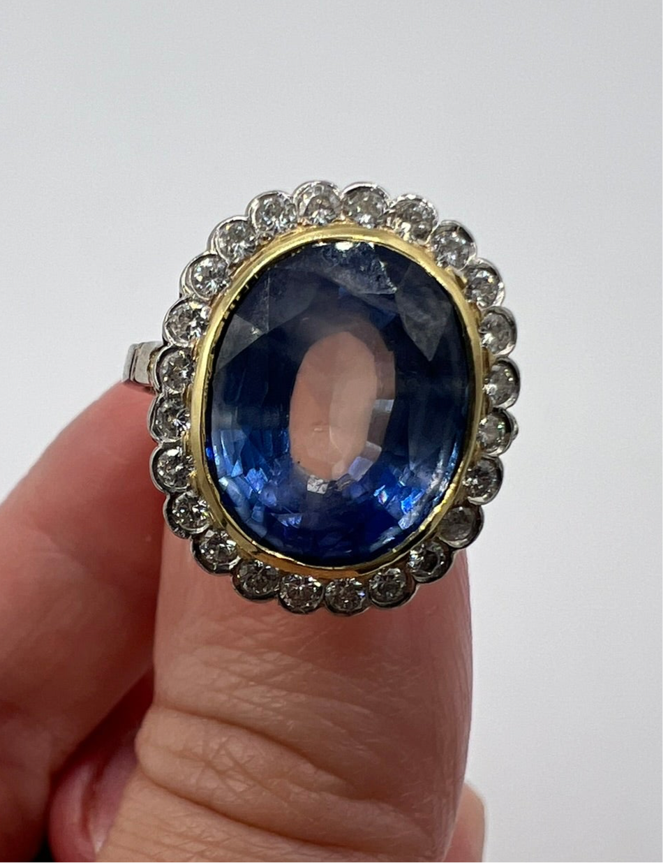 French Cornflower Blue Large 9+ Carat Sapphire Diamond Halo Ring in 18ct White Gold