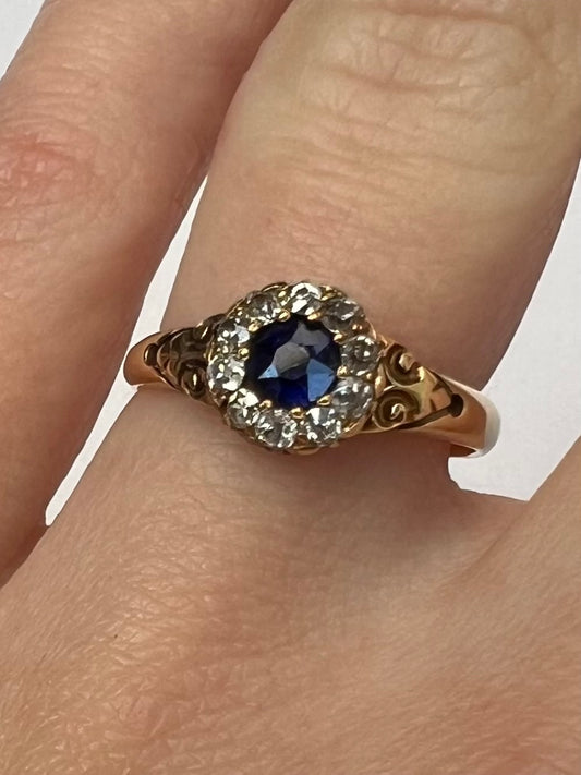 1888 Cute Sapphire Old Cut Diamond Halo 18ct Gold Ring