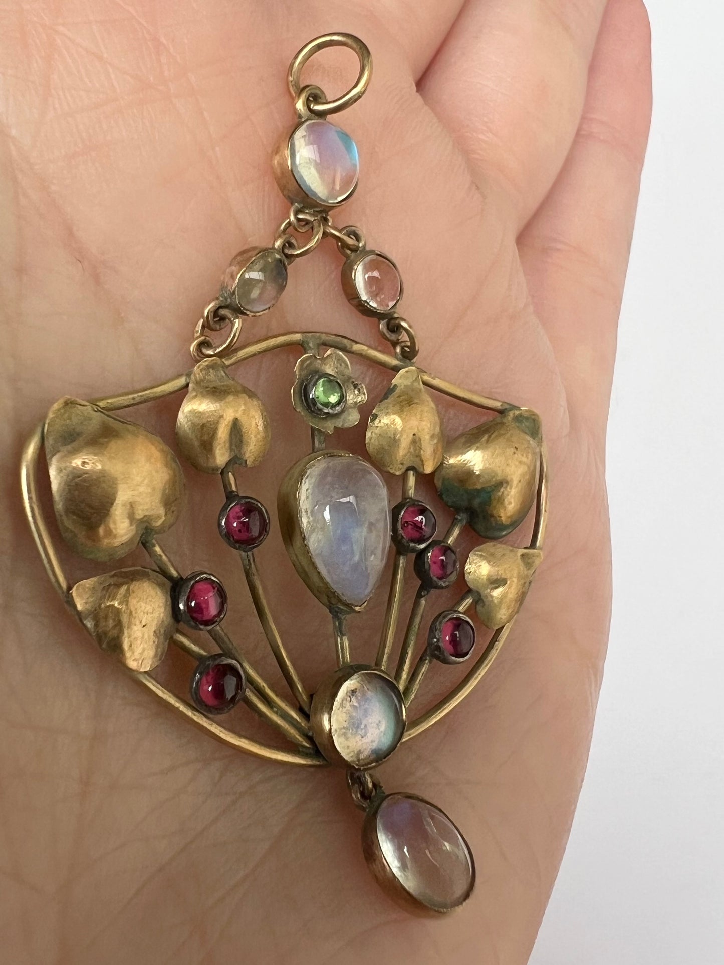 Arts & Crafts Gold Moonstone Garnet Peridot Pendant in the style of Murrle Bennett