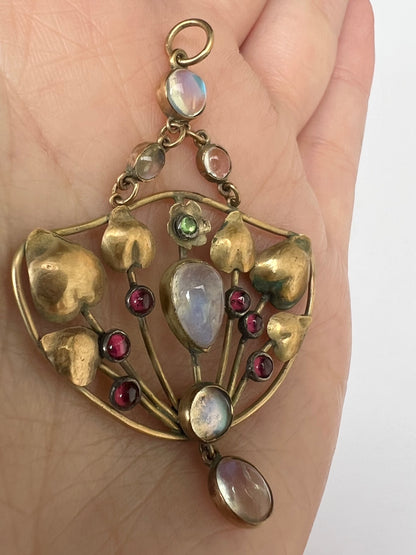 Arts & Crafts Gold Moonstone Garnet Peridot Pendant in the style of Murrle Bennett