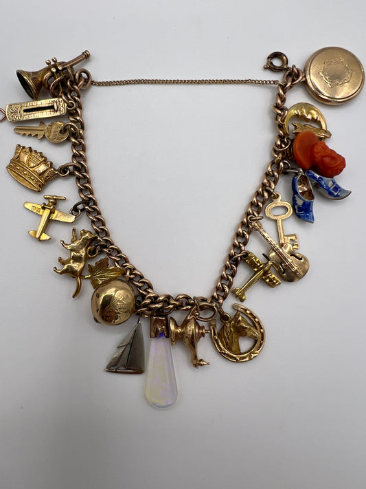 Gold Charm Bracelet With Many Unusual and Rare Charms