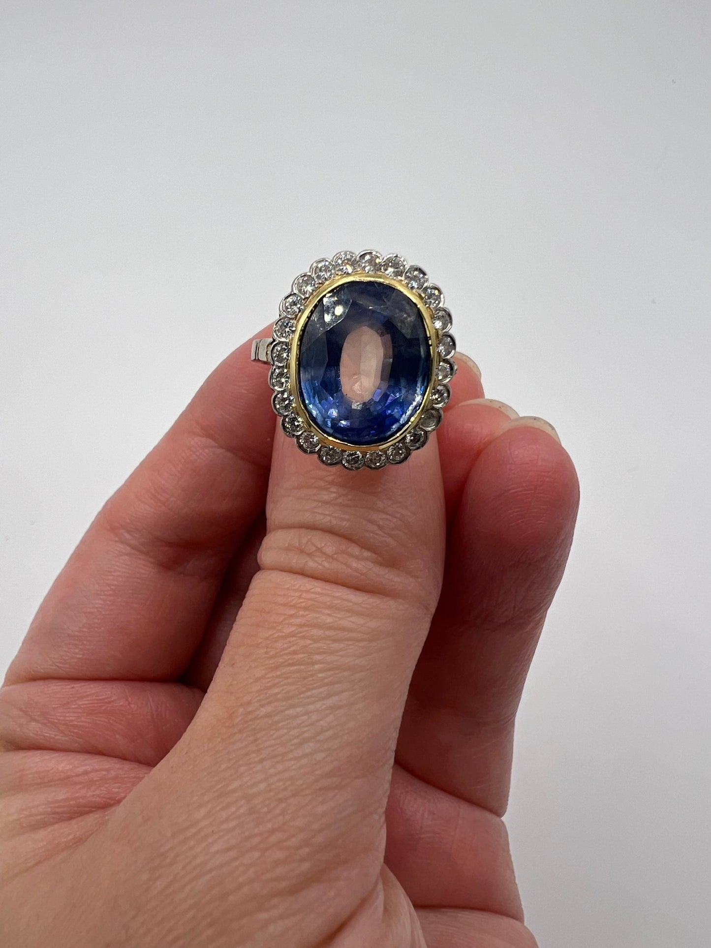 French Cornflower Blue Large 9+ Carat Sapphire Diamond Halo Ring in 18ct White Gold