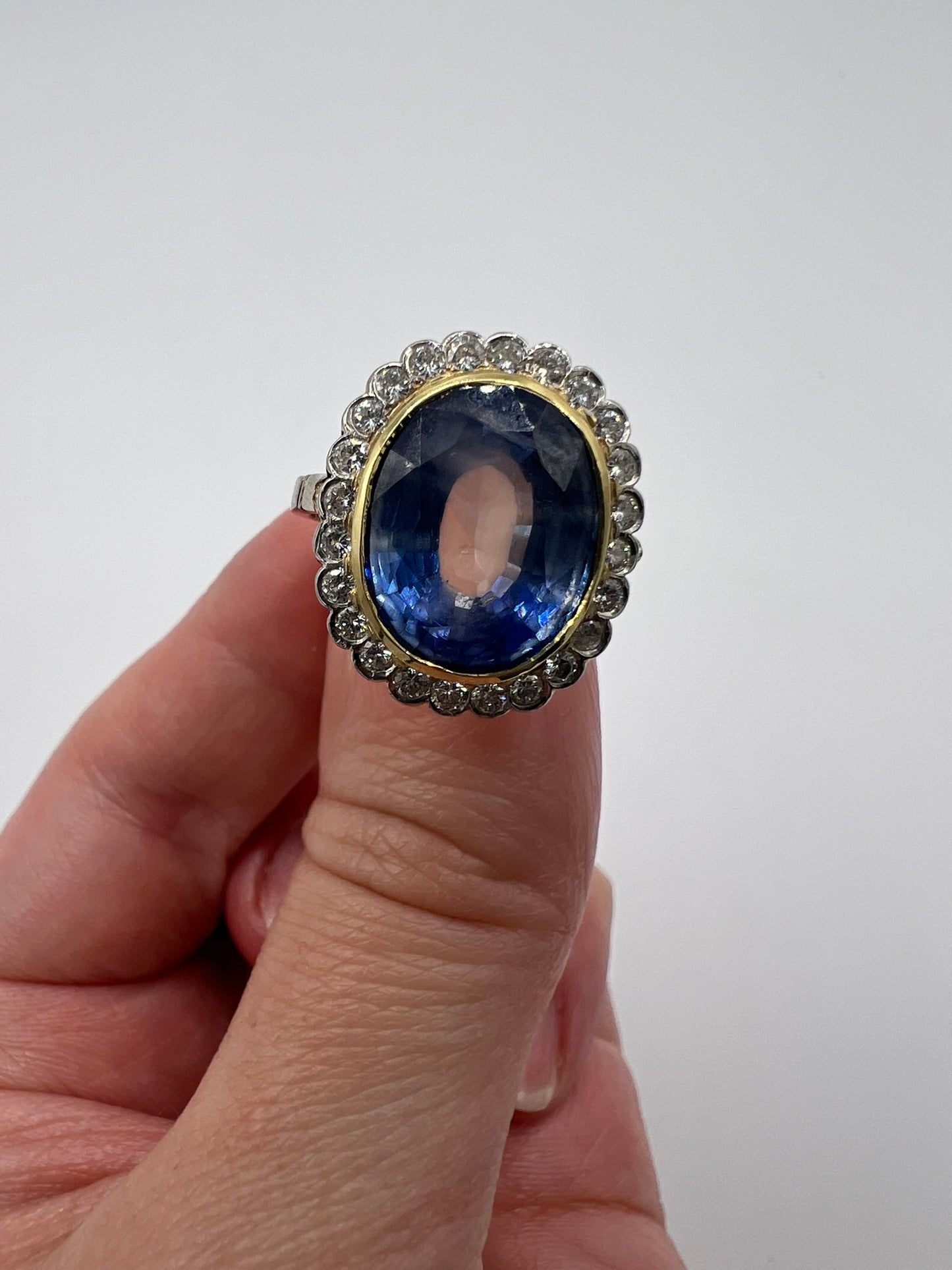 French Cornflower Blue Large 9+ Carat Sapphire Diamond Halo Ring in 18ct White Gold