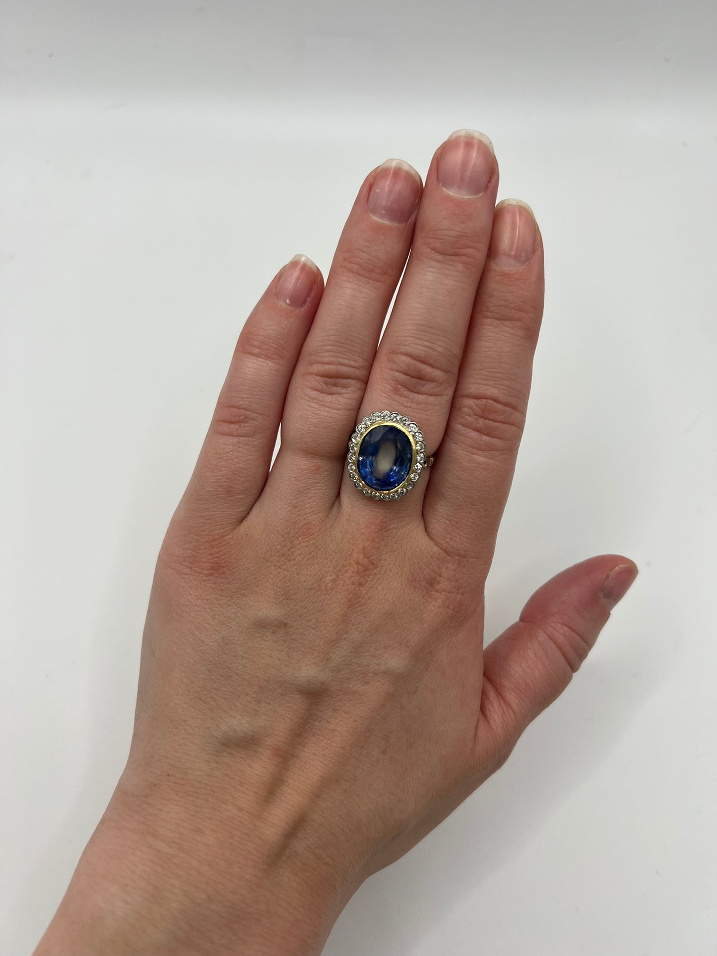 French Cornflower Blue Large 9+ Carat Sapphire Diamond Halo Ring in 18ct White Gold